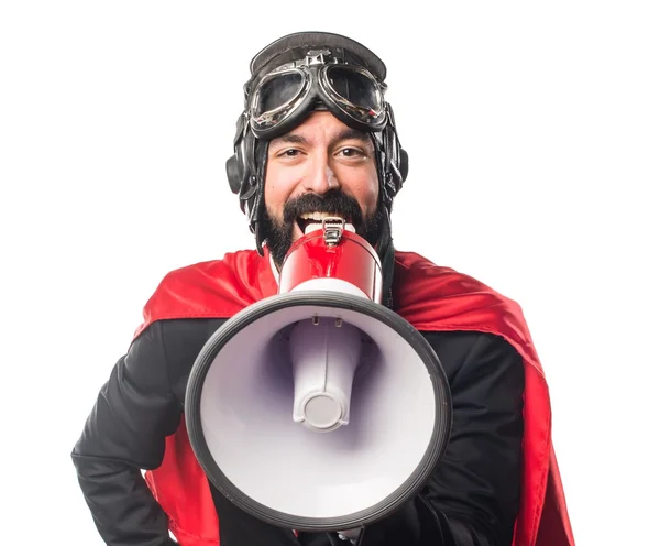 Super héroe hombre de negocios gritando por megáfono —  Fotos de Stock