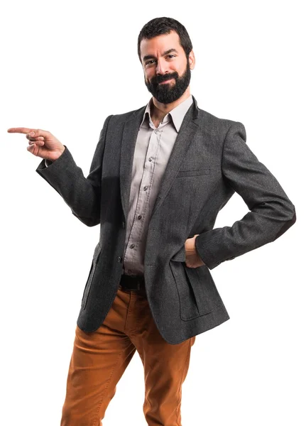 Man pointing to the lateral — Stock Photo, Image
