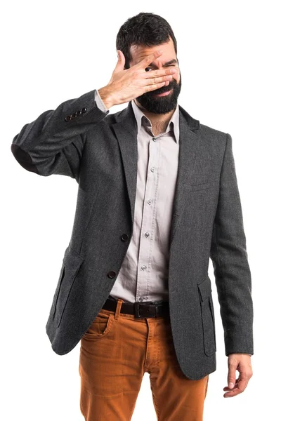 Muž zakrývající jeho tvář — Stock fotografie