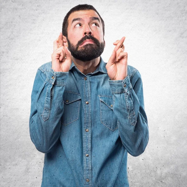 Man with his fingers crossing — Stock Photo, Image