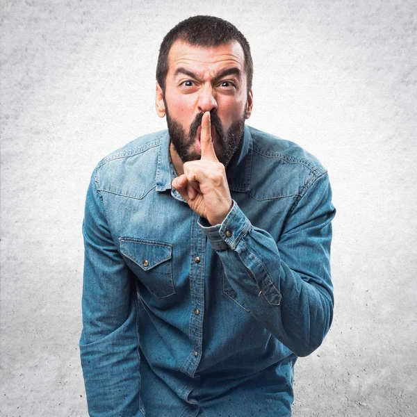 Man making silence gesture — Stock Photo, Image