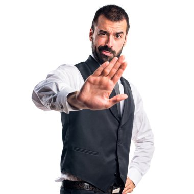 İşadamı dur işareti yapıyor