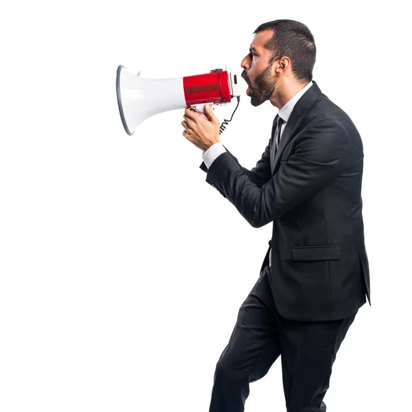 Empresário gritando por megafone — Fotografia de Stock