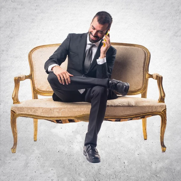 Businessman talking to mobile — Stock Photo, Image