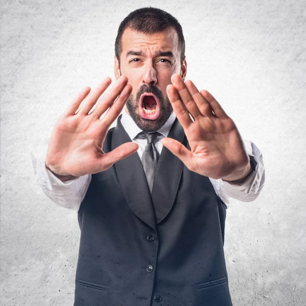 Empresario haciendo señal de stop — Foto de Stock