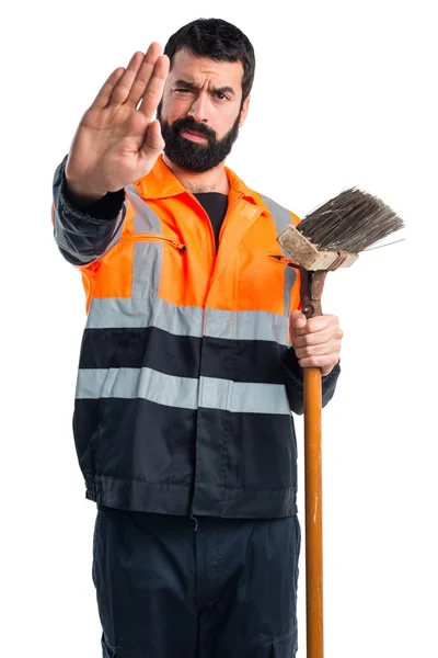 Spazzatura uomo facendo stop segno — Foto Stock