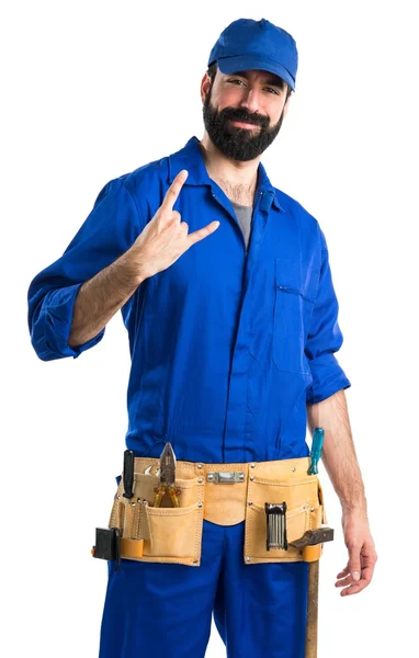 Plumber making horn gesture — Stock Photo, Image