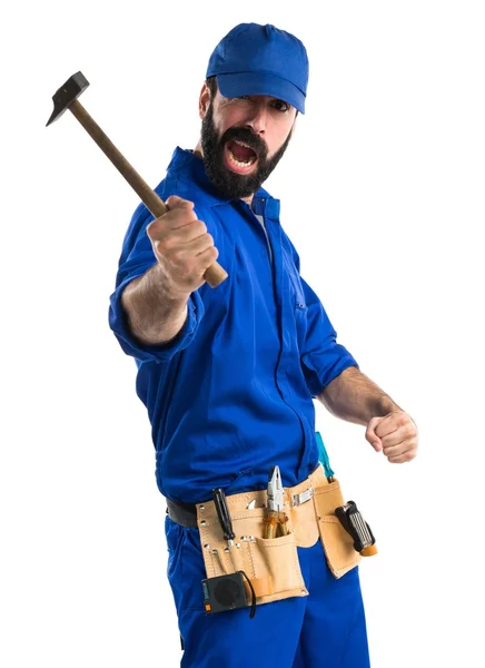 Plumber holding a hammer — Stock Photo, Image