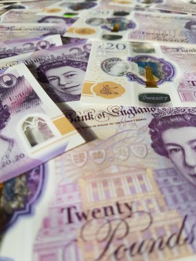 İngiltere 'nin Yeni Büyük Britanya Poundu Sterling Polymer İngiltere Bankası' ndan Kraliçe Elizabeth 'in portresini gösteren 20 Pound banknotlar.