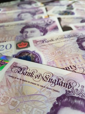 İngiltere 'nin Yeni Büyük Britanya Poundu Sterling Polymer İngiltere Bankası' ndan Kraliçe Elizabeth 'in portresini gösteren 20 Pound banknotlar.