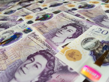 İngiltere 'nin Yeni Büyük Britanya Poundu Sterling Polymer İngiltere Bankası' ndan Kraliçe Elizabeth 'in portresini gösteren 20 Pound banknotlar.
