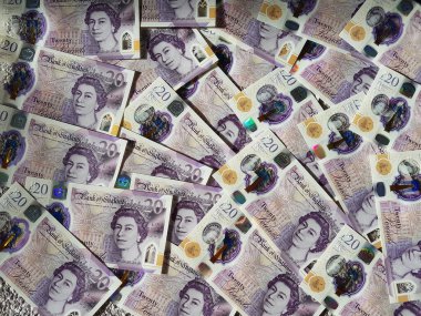 İngiltere 'nin Yeni Büyük Britanya Poundu Sterling Polymer İngiltere Bankası' ndan Kraliçe Elizabeth 'in portresini gösteren 20 Pound banknotlar.