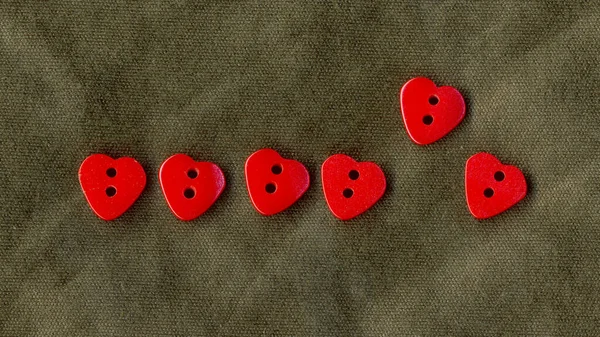 Heart line buttons sewing image. Life bar style romantic set. Symbol of love. Red buttons frame on fabric texture background wallpaper