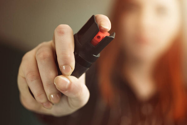 female hand with pepper spray. Selfdefence.