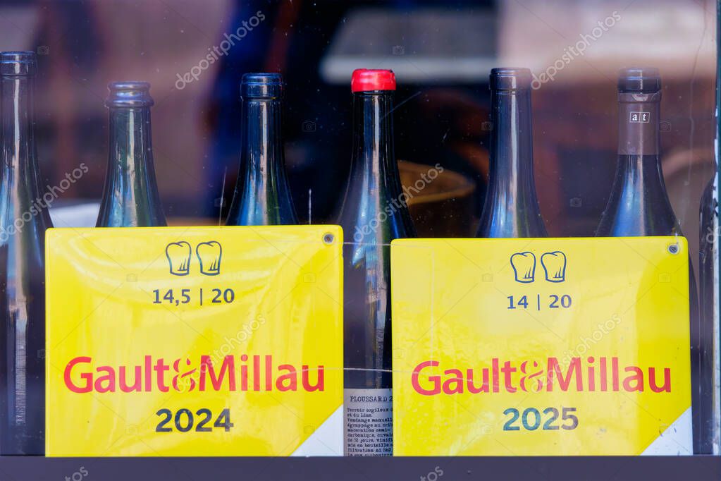Arnhem, The Netherlands - October 1, 2025: Restaurant display window with 2024 2025 Gault & Millau award placards in Arnhem, The Netherlands