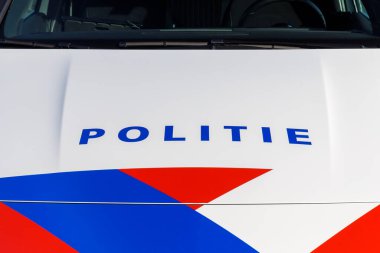 Close up of a police car with the Dutch text for 