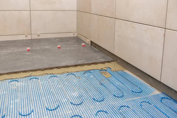 Renovation Improvement Concept Installing Floor Heating System Ceramic Tiles Bathroom — Stock Photo, Image