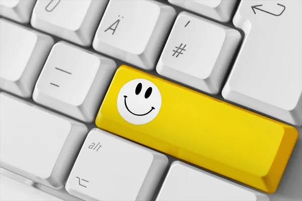 Computer keyboard with smile key — Stock Photo, Image