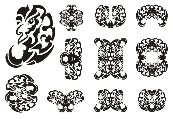 Symboles de dragon monstrueux tribaux — Image vectorielle