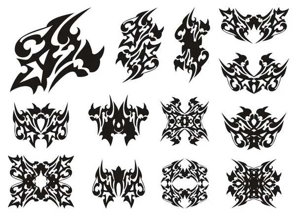 Símbolos tribales de dragón con cuernos — Vector de stock