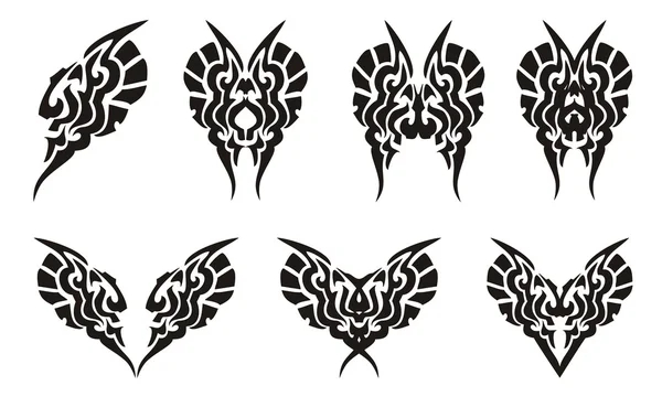 Tribal butterflies and hearts tattoos — Stock Vector