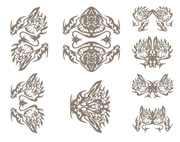 Símbolos de dragões em estilo tribal —  Vetores de Stock