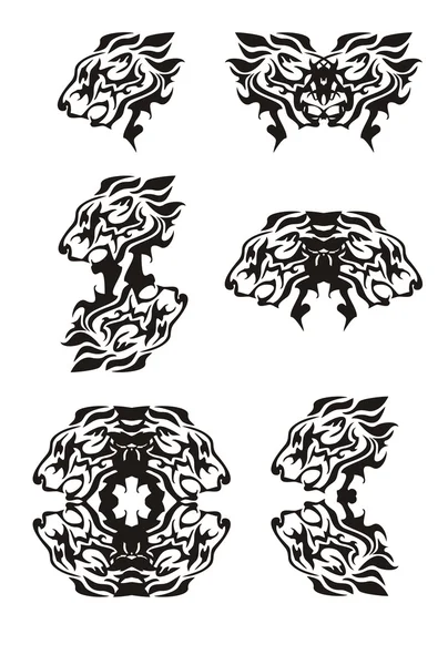 Símbolos de cabeça de leão flamejante tribal — Vetor de Stock