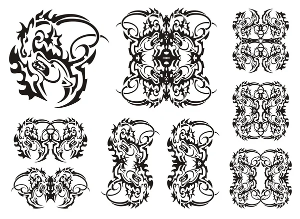 Symboles de loups tribaux — Image vectorielle
