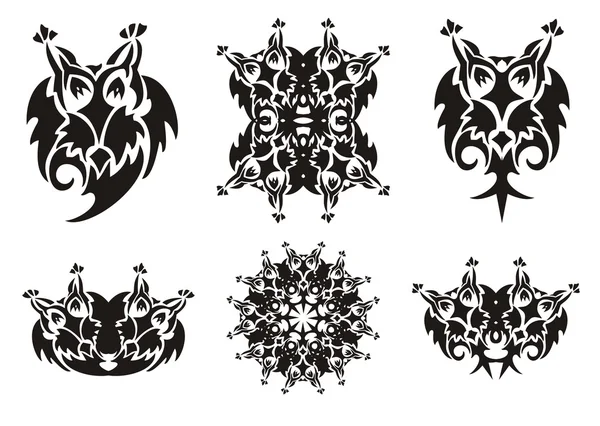 Simboli di gufo tribale. Nero sul bianco — Vettoriale Stock