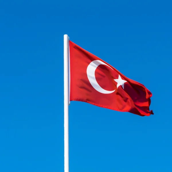Turkey flag on the blue sky Stock Photo by ©seralex 77627718