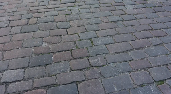 Bakgrundsstruktur av stenmur. trottoaren — Stockfoto