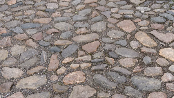 Het patroon van de achtergrond van de stenen muur. bestrating — Stockfoto