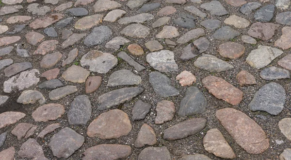 Bakgrundsstruktur av stenmur. trottoaren — Stockfoto