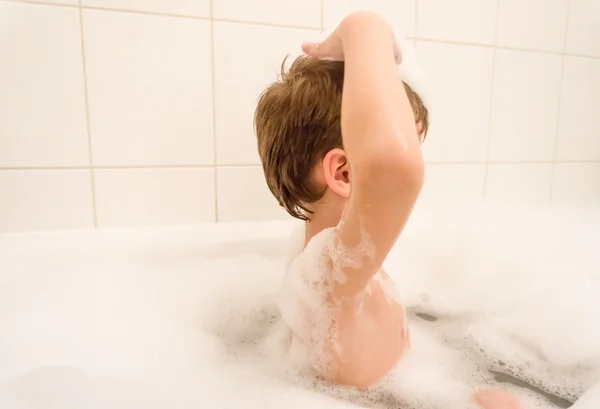 Wassen jongen grappige kind schuim Stockfoto