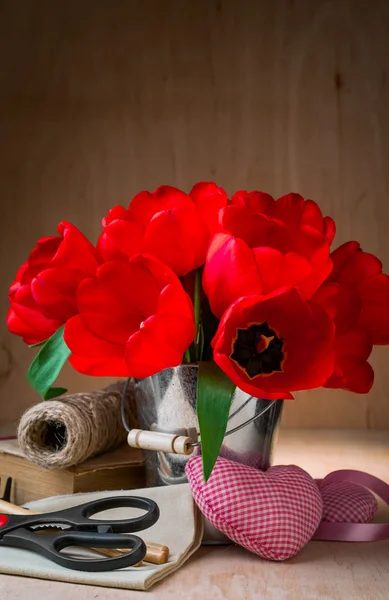 Tulips in bucket — Stock Photo, Image