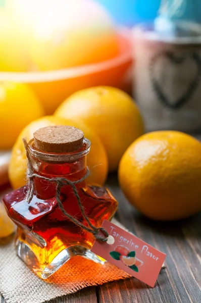 Mandarinkový chuť v láhvi ve tvaru hvězdy — Stock fotografie