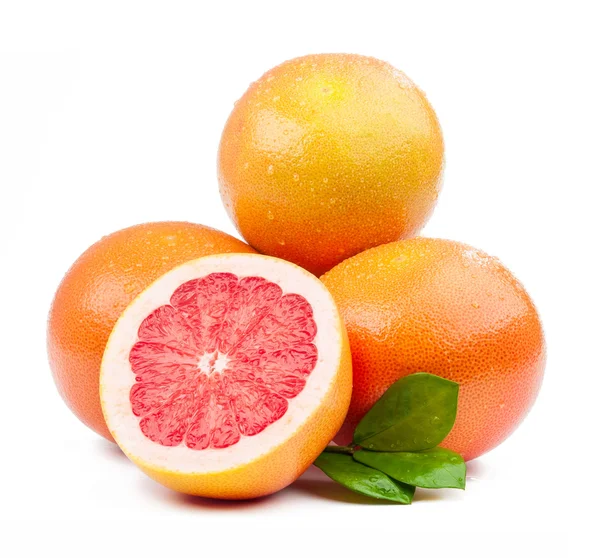 Three grapefruit and slice with leaves isolated — Stock Photo, Image