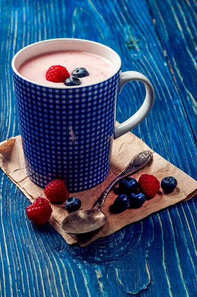 Raspberry and blueberries yogurt — Stock Photo, Image