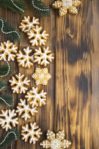 Christmas Composition Gingerbread Snowflakes Wooden Background Location Vertical — Stock Photo, Image