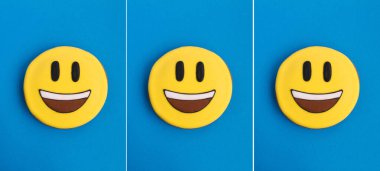 Mavi arka planda zencefilli kurabiye şeklinde bir gülen kolaj. Yakın plan..