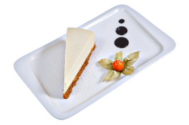Kare servis çanak üzerinde Porsiyon cheesecake süslenmiş Physalis, beyaz.