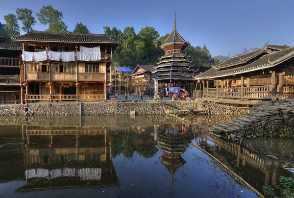 Wooden structure Chinese countryside are reflected in water river rural. — Stock Photo, Image