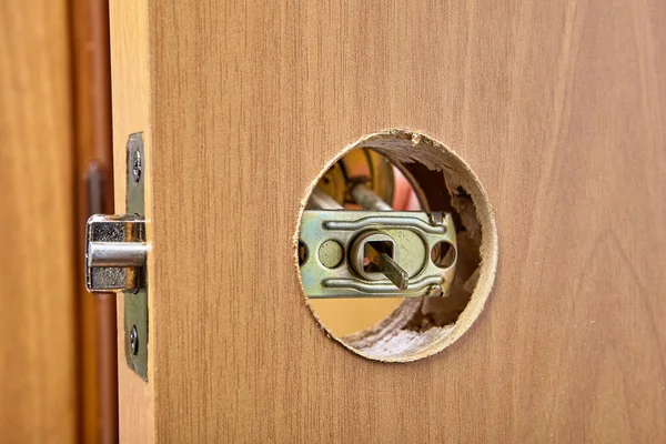 Carpenter Secures First Half Doorknob Latch — Stock Photo, Image