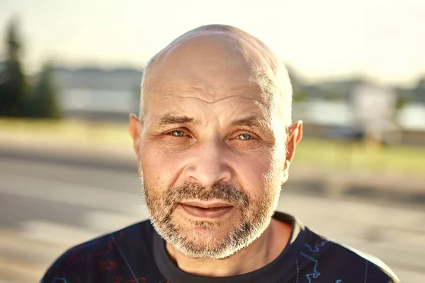 Portrait of caucasian middle age man 60 years old outdoors. — Stock Photo, Image