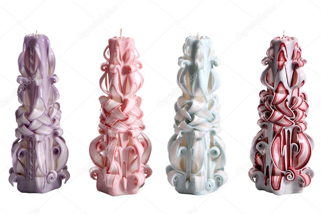 Four Christmas holidays paraffin candle wax carving, isolated on