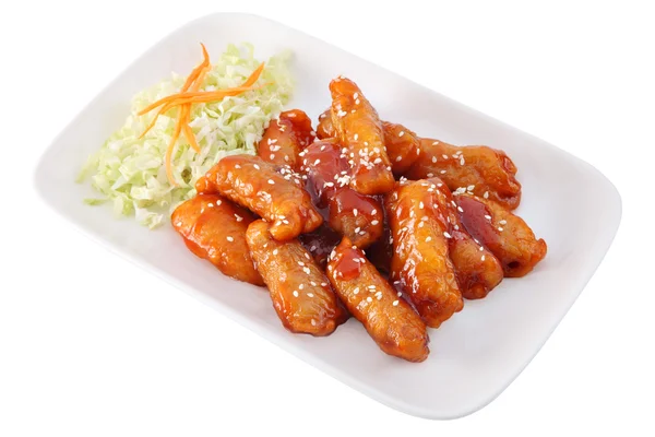 Pork in sour-sweet sauce with salad of fresh cabbage. — Stock Photo, Image