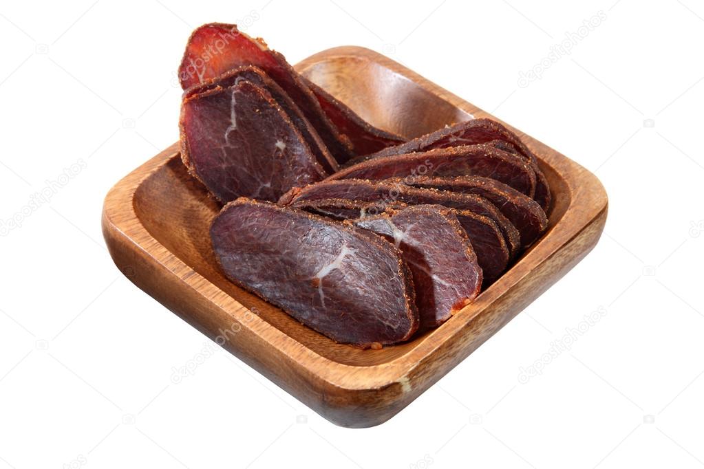 Basturma, dried tenderloin of beef meat, thinly sliced, on white