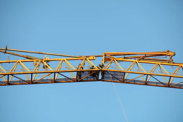 Erection of tower crane, connecting outer jib to inner jib. — Stock Photo, Image