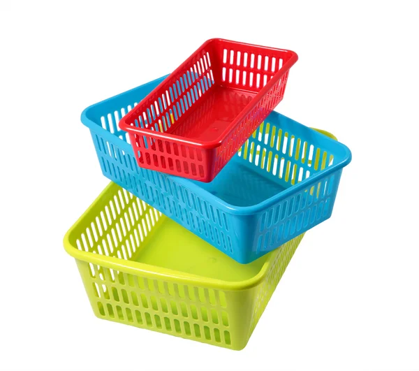 Caixas coloridas de diferentes tamanhos, cestas para armazenamento, três recipientes . Imagem De Stock