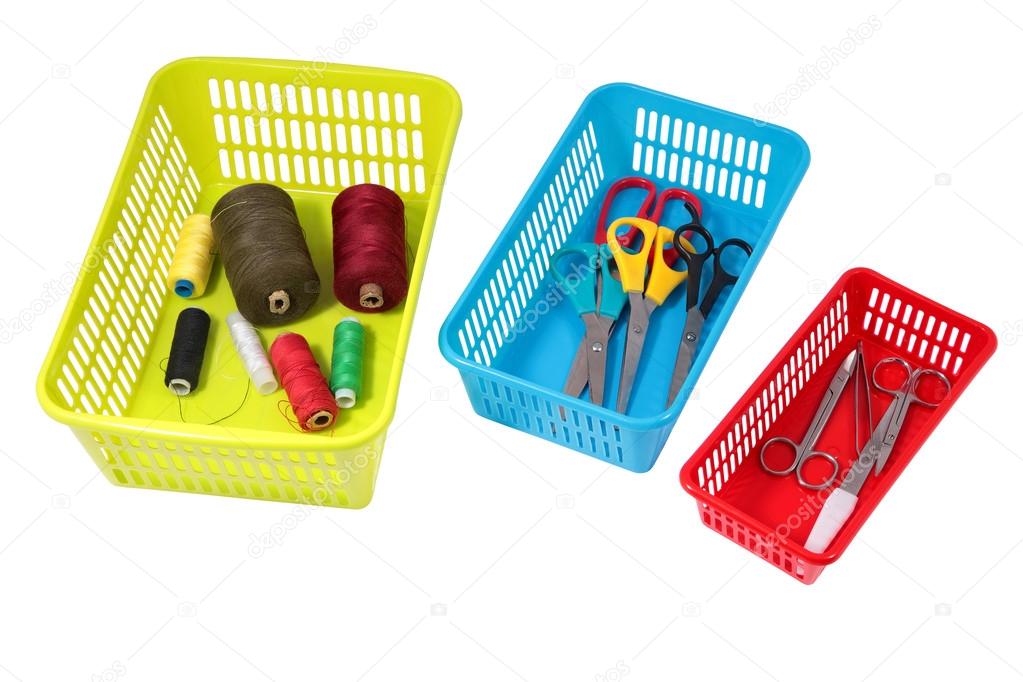 Home storage system, colored plastic perforated boxes with house